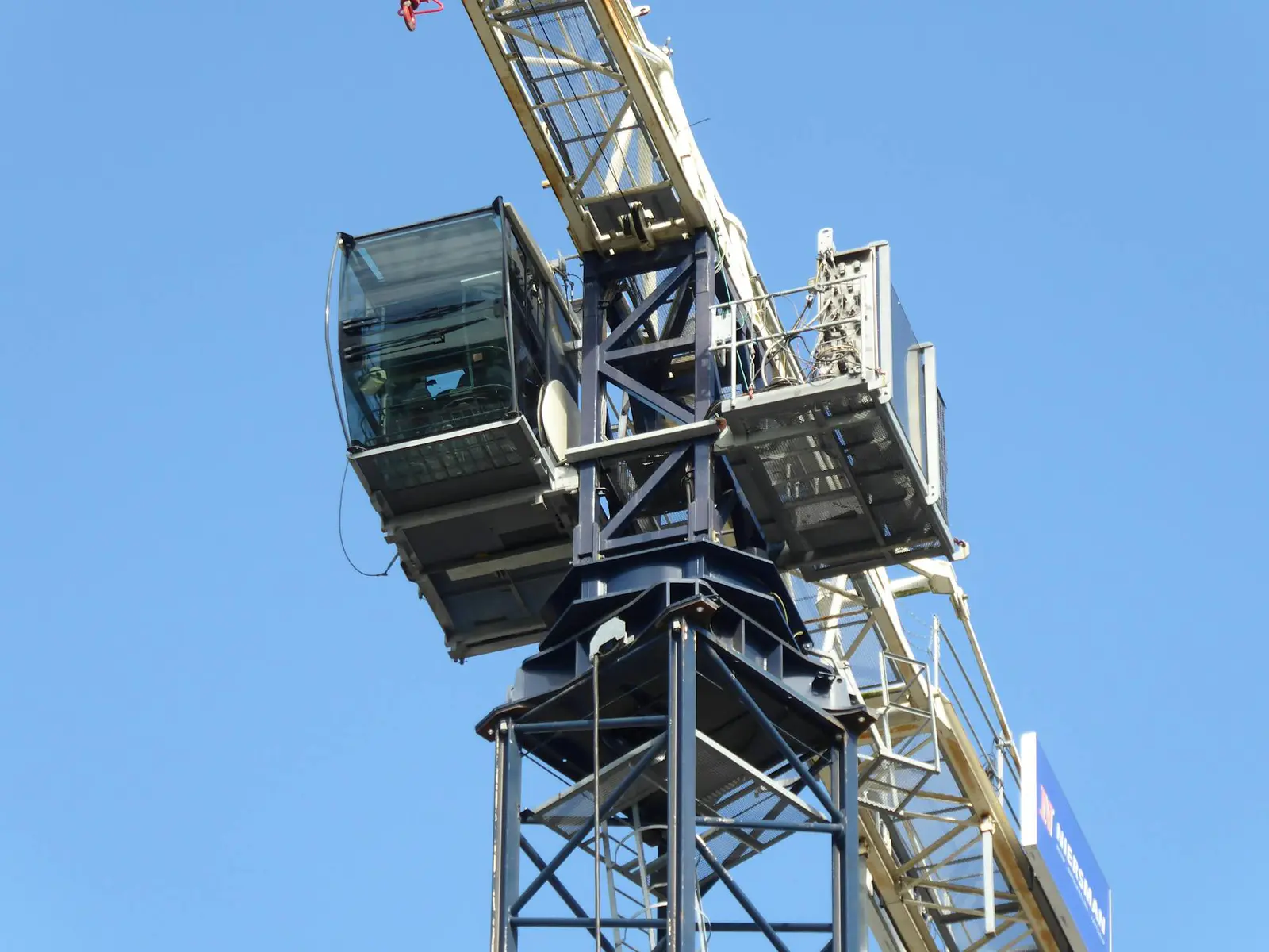 View from inside a modern crane cabin overlooking a site